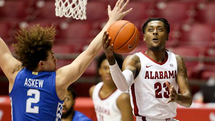 Alabama's John Petty Jr. drives to the basket against Kentucky.